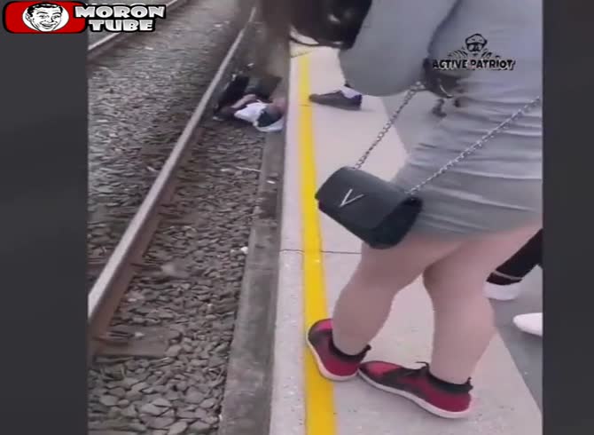 Video :Two elderly men are attacked by a gang of thugs at a rail station